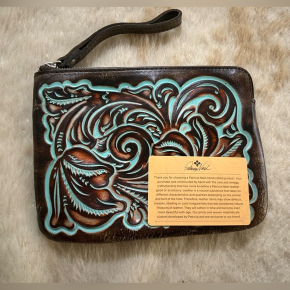 Patricia Nash Handbags - Patricia Nash Cassini Wristlet
Tooled Turquoise